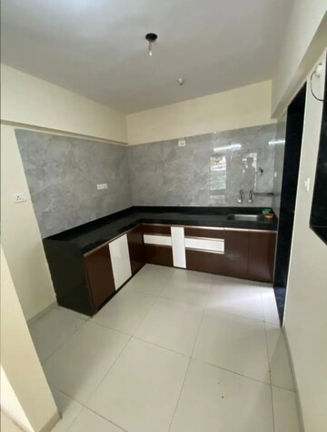 Kitchen in 2 BHK Apartment at Gini Belvista Phase 1, Dhanori – for Rent