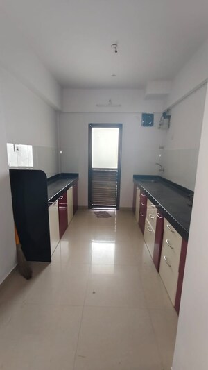 Kitchen in 2 BHK Apartment at Happy Valley, Manpada – for Sale