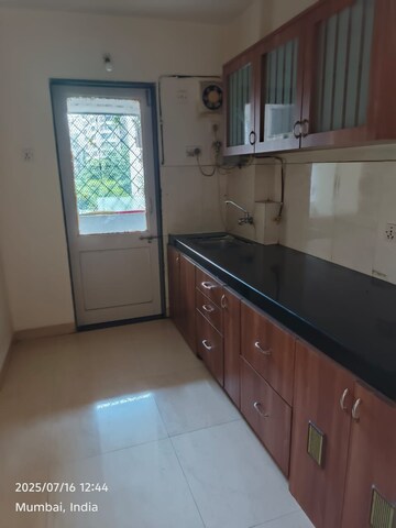Kitchen in 1 BHK Apartment at Satellite Garden, Goregaon East – for Rent