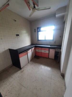 Kitchen in 2 BHK Apartment at Swastik Regalia, Waghbil – for Sale