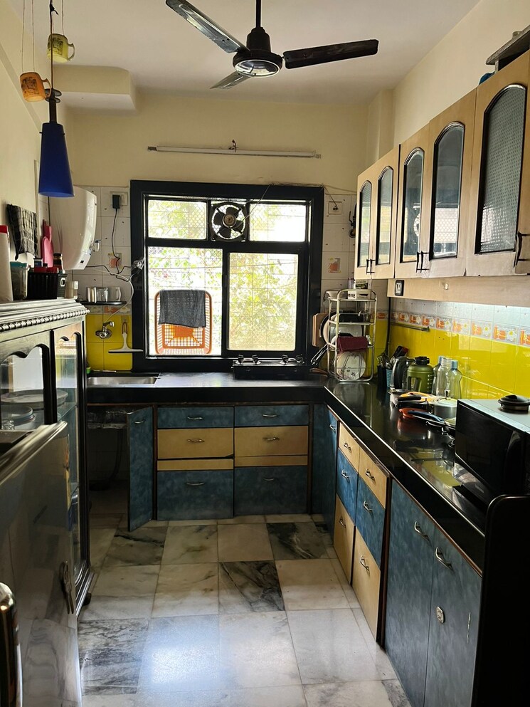 Kitchen, periwinkle-apartment Pg For Boys In Malad West 9018670
