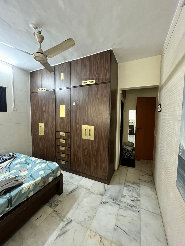 Bedroom, periwinkle-apartment Pg For Boys In Malad West 9018670