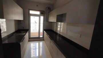 Kitchen in 2 BHK Apartment at Rustomjee Azziano Wing D, Thane West – for Sale