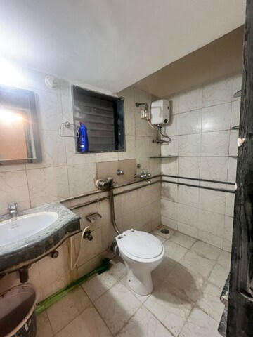 Bathroom in 3 BHK Apartment at Andheri West – for Rent