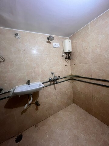 Bathroom in 3 BHK Apartment at Andheri West – for Rent