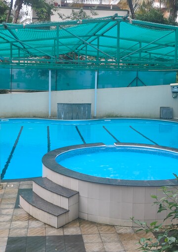 Swimming Pool in 1.5 BHK Apartment at B. U. Bhandari Planet Millenium Row House, Pimple Saudagar – for Rent