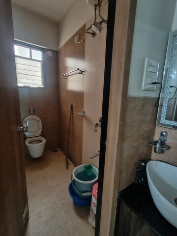 Bathroom in 1.5 BHK Apartment at B. U. Bhandari Planet Millenium Row House, Pimple Saudagar – for Rent