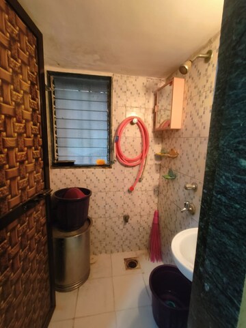 Bathroom in 1 BHK Apartment at Anjali Kiran CHS, Santacruz East – for Rent