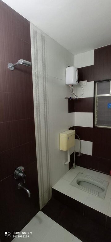 Bathroom in 2 BHK Apartment at G K Daffodils Housing Society, Pimple Saudagar – for Sale