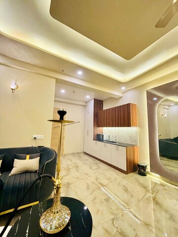 Living Room in Studio Apartment at Gaur City Center, Sector 4 Greater Noida – for Rent