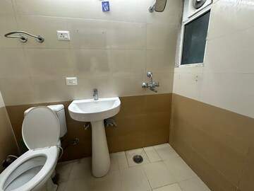 Bathroom in 2 BHK Apartment at High End Paradise II, Raj Nagar Extension – for Sale