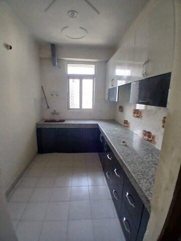 Kitchen in 2 BHK Apartment at High End Paradise II, Raj Nagar Extension – for Sale