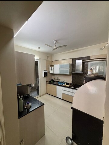 Kitchen in 3 BHK Apartment at Nyati Wind Chimes, Undri – for Rent