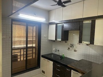 Kitchen in 2 BHK Apartment at Dream Shubhamkaroti CHS, Bhaskar Colony – for Rent