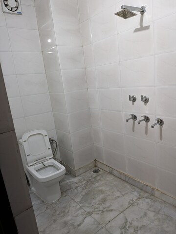 Bathroom in 2.5 BHK Builder Floor at Nirman Vihar – for Rent