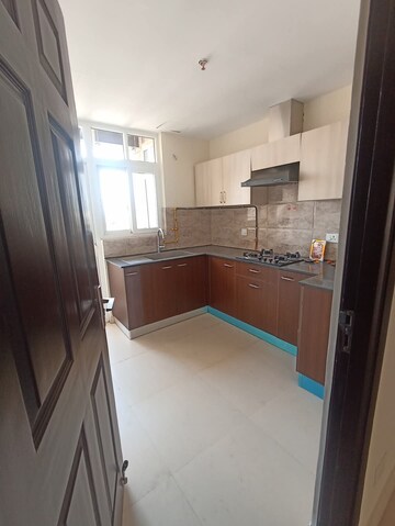 Kitchen in 3 BHK Apartment at Wave Amore, Sector 32 – for Rent