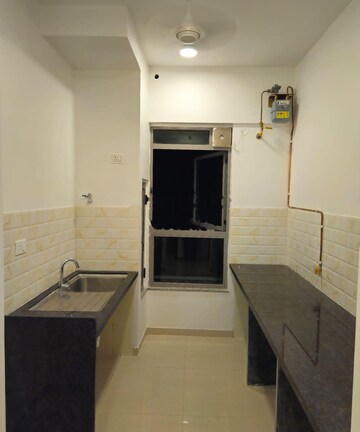 Kitchen in 1 BHK Apartment at Kalpataru Immensa, Kolshet Road – for Rent