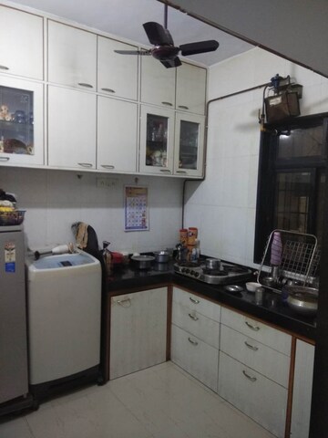 Kitchen in 2 BHK Apartment at Vijay Apartments Waghbil, Waghbil – for Rent
