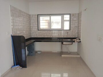 Kitchen in 2 BHK Apartment at Venkateshwara Fragrancia, Koregaon – for Rent