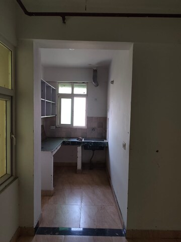 Kitchen in 2 BHK Apartment at Nitishree Aura Chimera, Raj Nagar Extension – for Rent