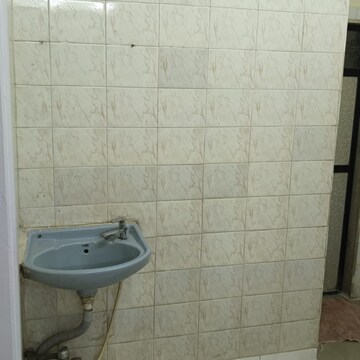 Bathroom in 1 BHK Apartment at Rajesh Nagar CHS, Mahavir Nagar – for Rent