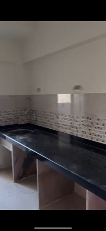 Kitchen in 2 BHK Apartment at Damji Shamji Mahavir Tower, Mulund West – for Rent
