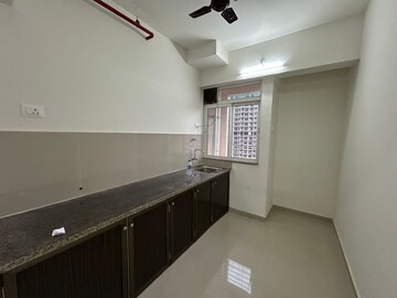 Kitchen in 2 BHK Apartment at Puranik Hometown, Ghodbunder Road – for Sale