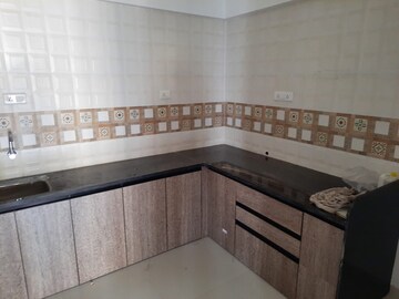 Kitchen in 2 BHK Apartment at Shree Nidhi, Lohgaon – for Rent