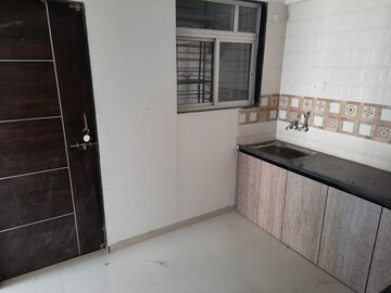 Kitchen in 2 BHK Apartment at Shree Nidhi, Lohgaon – for Rent