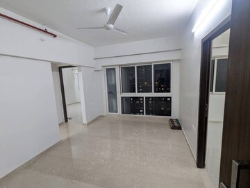 Building Lobby in 2 BHK Apartment at Omkar Signet, Malad East – for Rent
