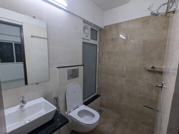 Bathroom in 2 BHK Apartment at Omkar Signet, Malad East – for Rent