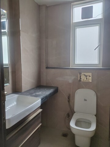 Bathroom in 3 BHK Apartment at Smart World Orchard, Sector 61 – for Rent