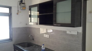 Kitchen in 2 BHK Apartment at Acme Ozone, Manpada – for Sale