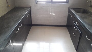 Kitchen in 2 BHK Apartment at Acme Ozone, Manpada – for Sale