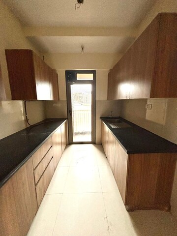 Kitchen in 2.5 BHK Apartment at Lodha Splendora, Ghodbunder Road – for Rent