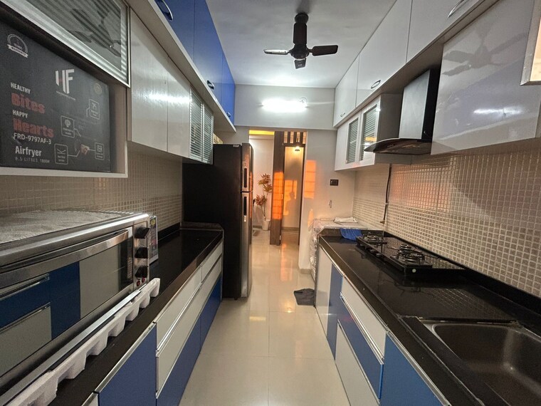 Kitchen, cosmos-jewels 3 Bedroom 750 Sq.Ft. Apartment In Ghodbunder Road Thane 9020101