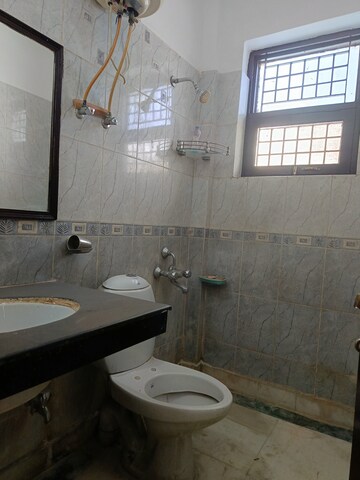 Bathroom in 3 BHK Builder Floor at Kohli One Malibu Town, Sector 47 – for Rent