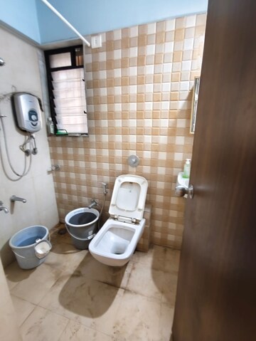 Bathroom in 2 BHK Apartment at Unnathi Woods Phase 3, Ghodbunder Road – for Rent