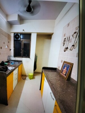 Kitchen in 1 BHK Apartment at Ashar Aria, Kalwa – for Sale