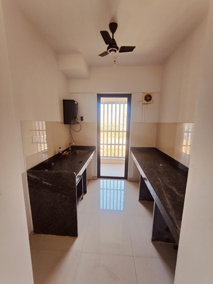 Kitchen, lodha-palava-city-lakeshore-greens 2 Bedroom 990 Sq.Ft. Apartment In Dombivli East Thane 9020195