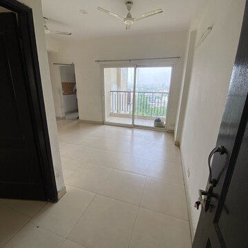 Living Room in 2.5 BHK Apartment at Aims Golf Avenue II, Sector 75 – for Rent
