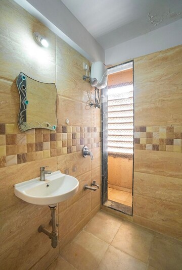 Bathroom in 1 BHK Apartment at Mahavir Kalpavruksha, Ghodbunder Road – for Sale