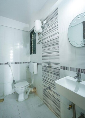 Bathroom in 1 BHK Apartment at Mahavir Kalpavruksha, Ghodbunder Road – for Sale