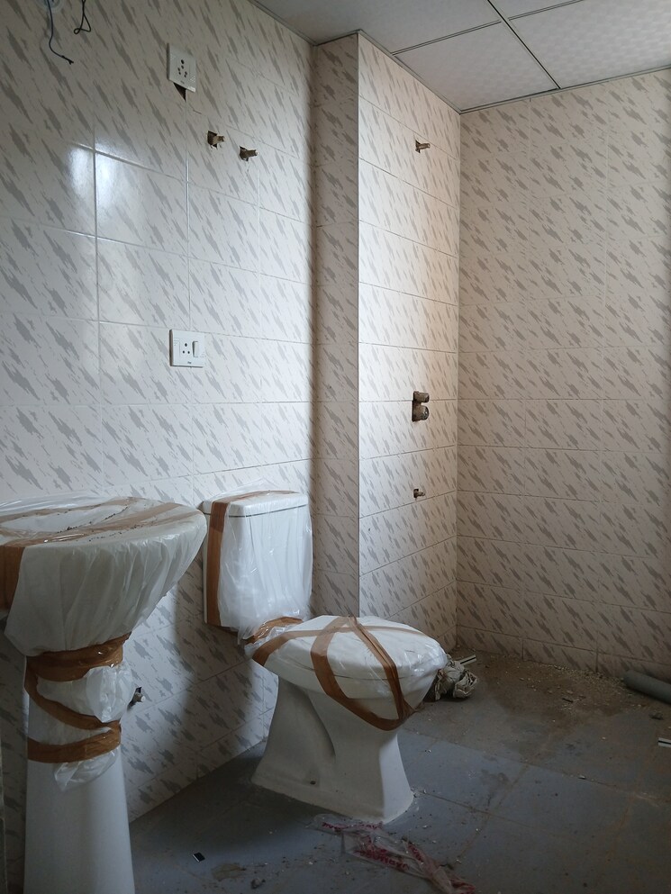 Bathroom, agrasain-spaces-aagman-phase-2 2 Bedroom 634 Sq.Ft. Apartment In Sector 70 Faridabad 9020687