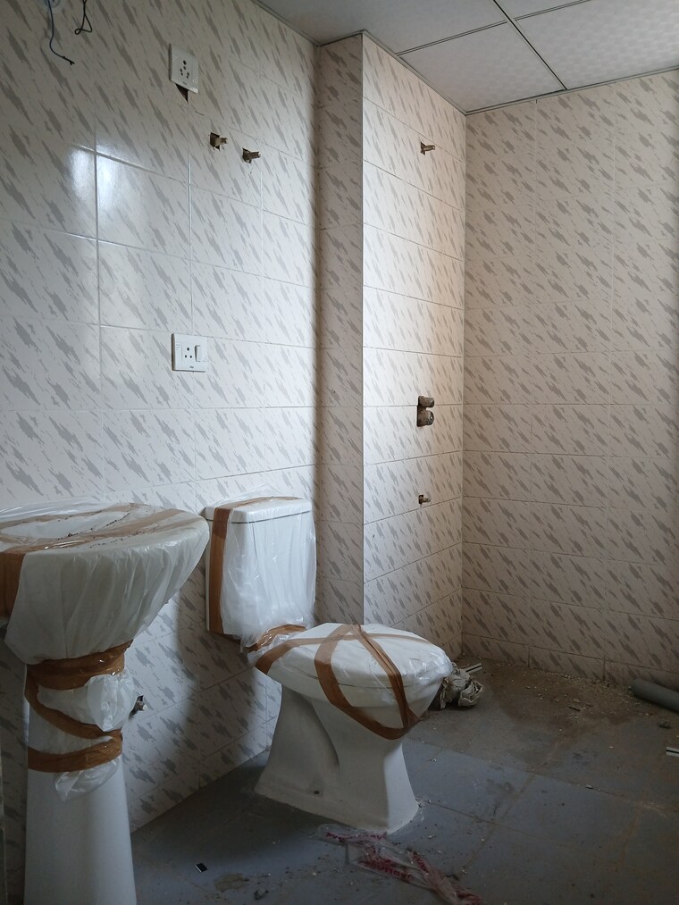 Bathroom, agrasain-spaces-aagman-phase-2 2 Bedroom 634 Sq.Ft. Apartment In Sector 70 Faridabad 9020687