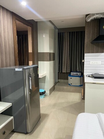 Living Room in Studio Apartment at Tak The Forest Residency, Malsi – for Rent