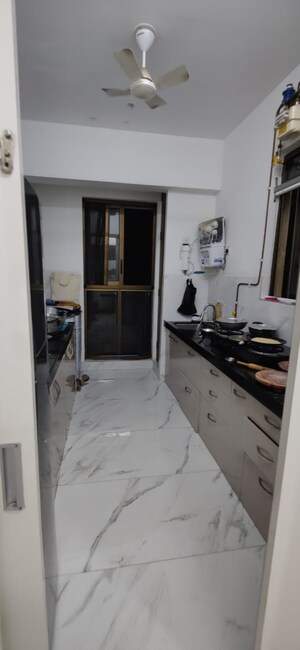 Kitchen in 2 BHK Apartment at Raymond Ten X Habitat, Pokhran Road No Two – for Sale