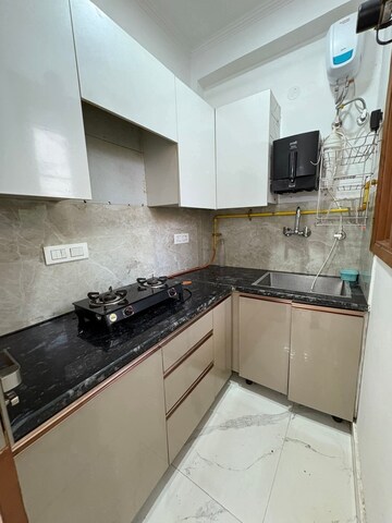 Kitchen in 1 BHK Apartment at Freedom Fighters Enclave – for Rent