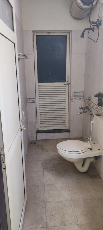 Bathroom in 1 BHK Apartment at K Raheja Palm Court, Malad West – for Rent