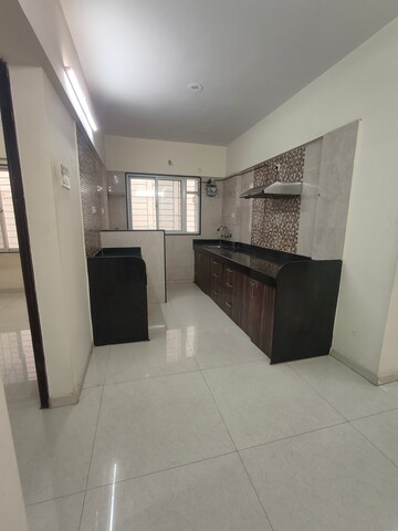 Kitchen in 2 BHK Apartment at Kunal Icon, Pimple Saudagar – for Sale